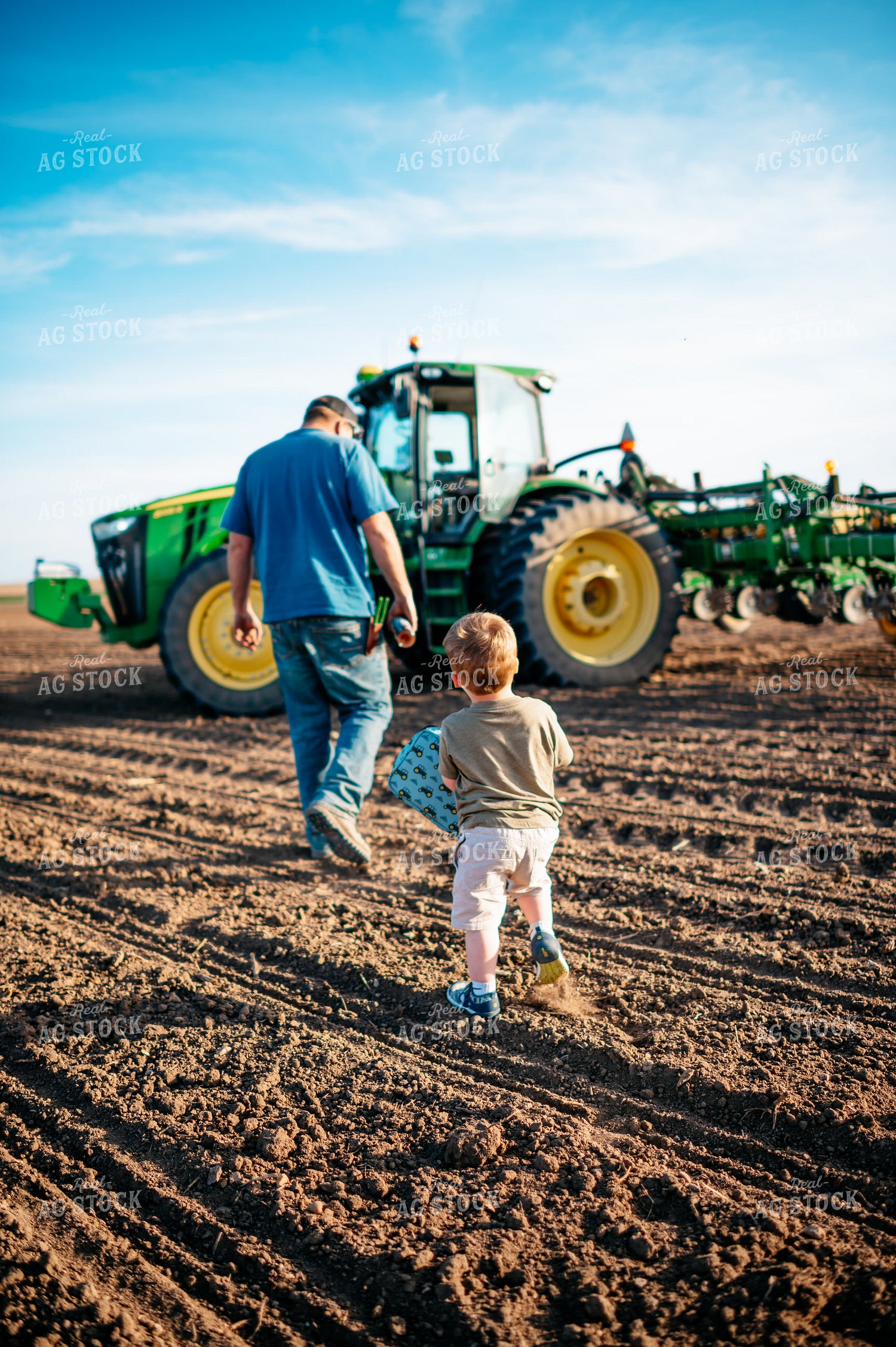 Farm Kid Walks to Tractor with Lunch Box 56642