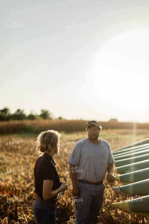 Farmer and Agronomist Talking in Field 8279