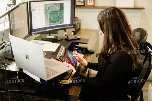 Female Appraiser Working at Computer 9420