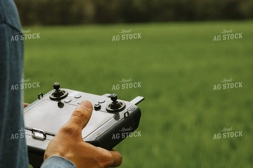Close Up of Farmer's Hands Flying Drone 101043