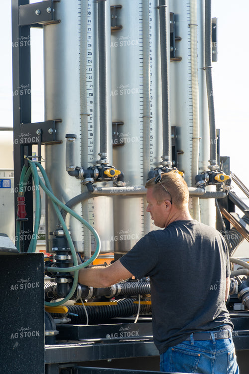 Farmer Mixing Chemicals 65718