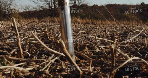 Pushing Soil Sample Probe into the Ground - Close Up 3925