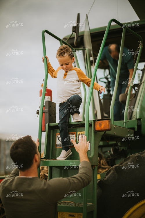 Farm Kid Getting out of Combine 6614