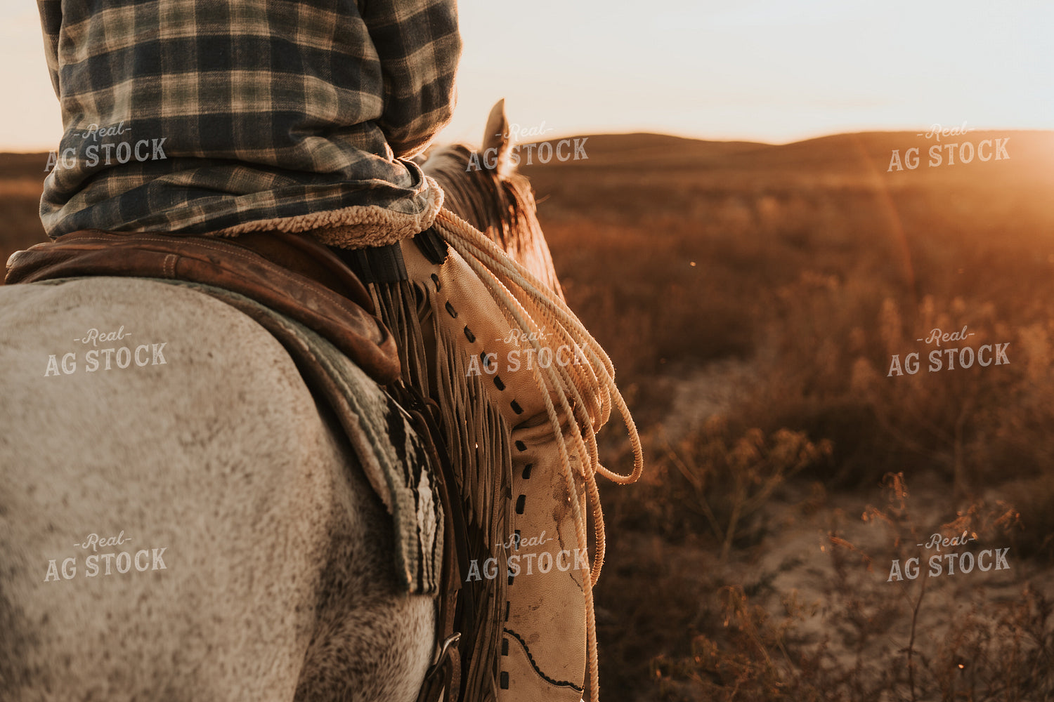 Cowboy on Horseback Watching Sunset 61200