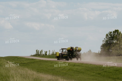Tractor and Planter on Road 185131