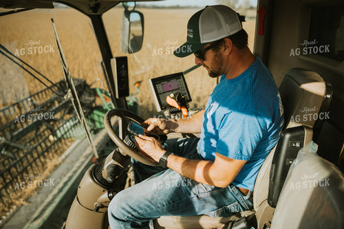 Farmer Operating Combine 7110