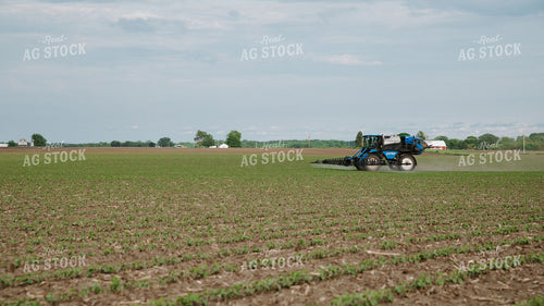 Self-Propelled Sprayer Applying Crop Protection on Early-Season Field 401010