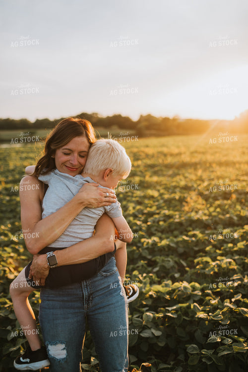 Farmer and Farm Kid in Field 6023