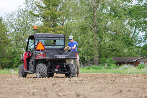 Farmer Picking Up Rocks 109178