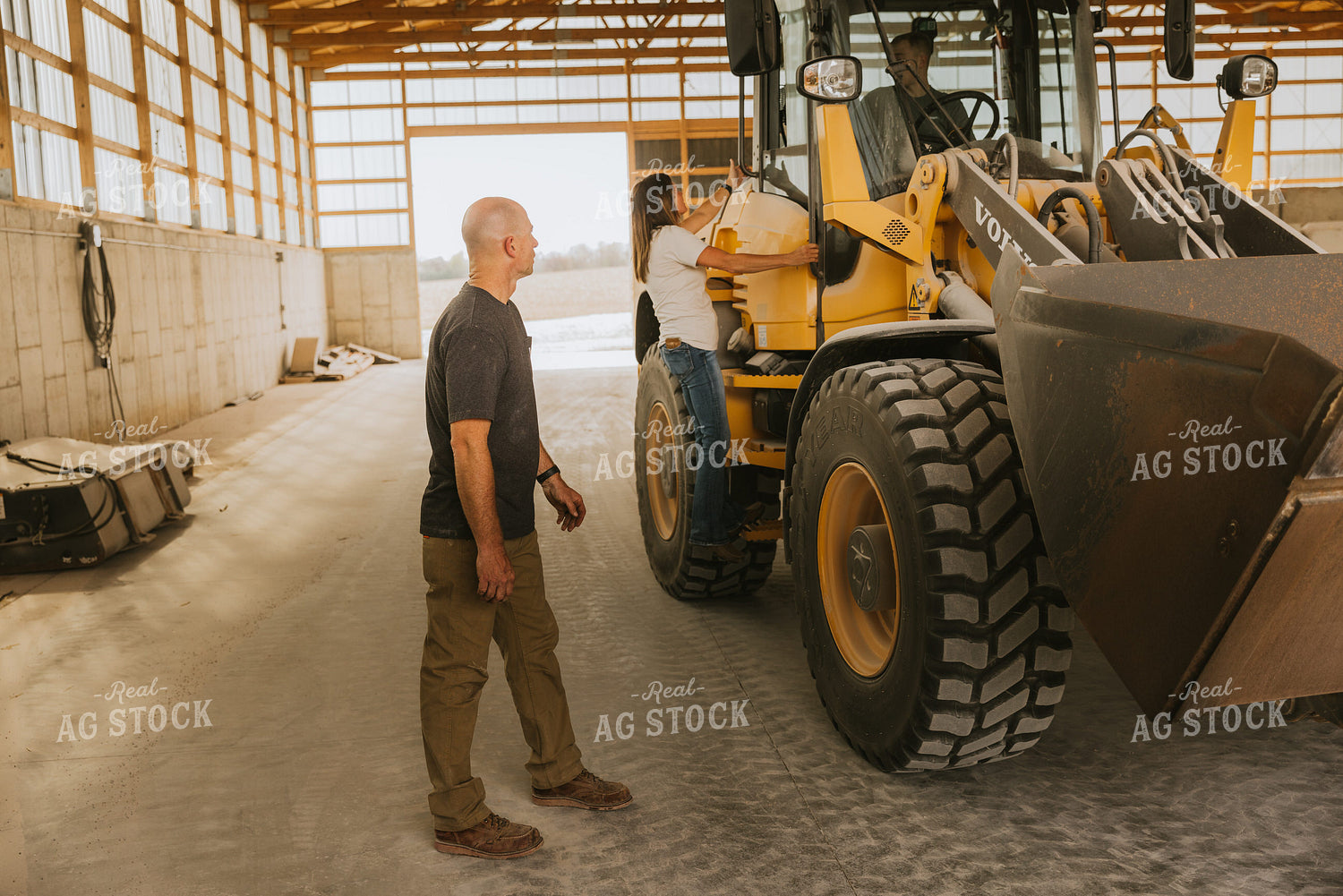 Farmers Talk to One Another in Shed 7542