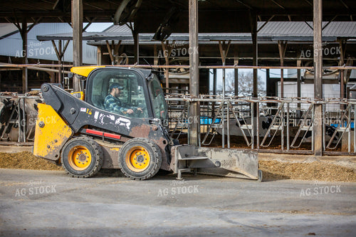 Farmer Driving Skidsteer 270067