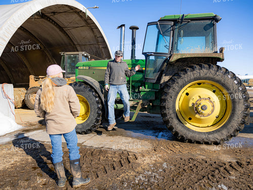 Ranchers Talking in Farmyard 70191