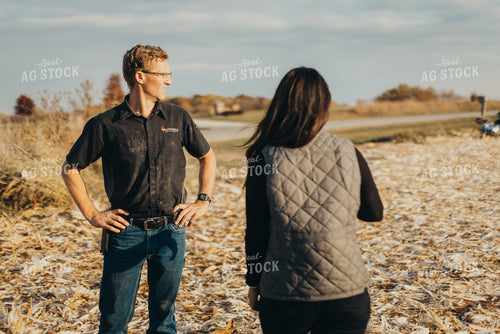 Farm Wife and Farmer in the Field 9474