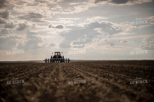 Tractor Planting Field from Ground Level 135023