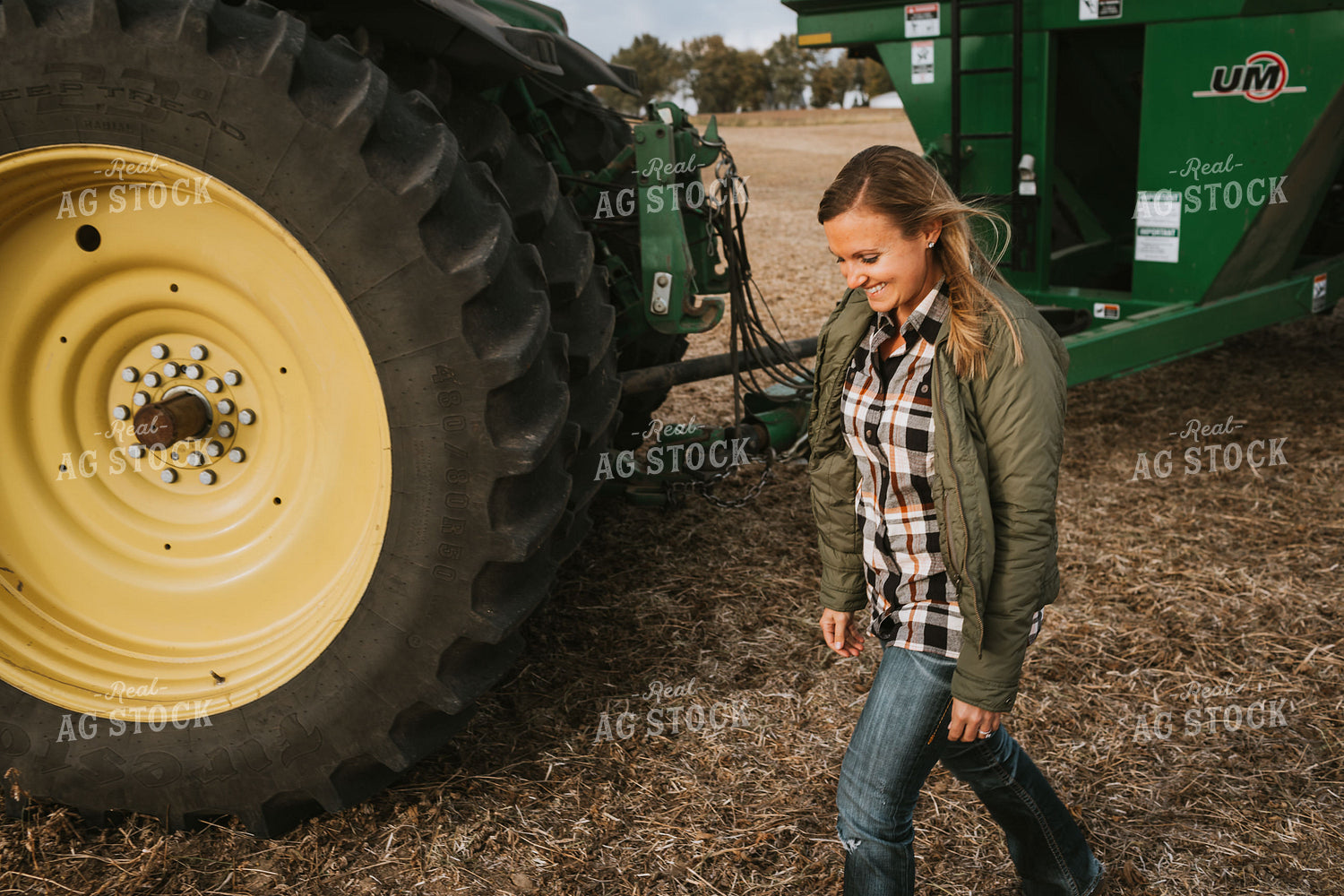 Female Farmer with Grain Cart 3510