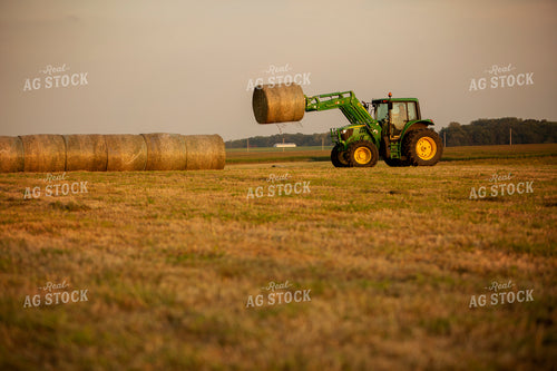 Tractor Lifting Round Hay Bale 5522
