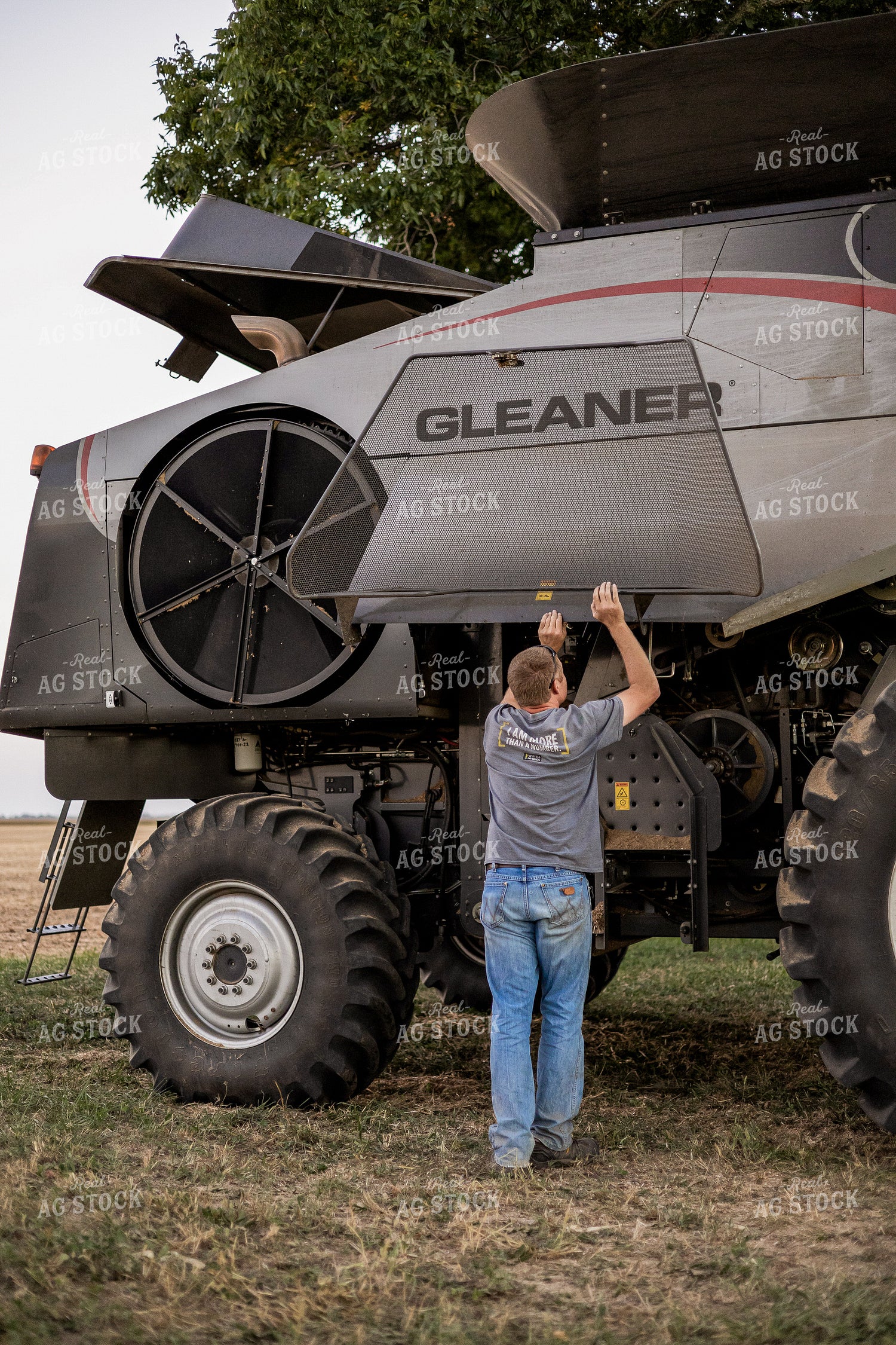 Farmer Working on Combine 93347