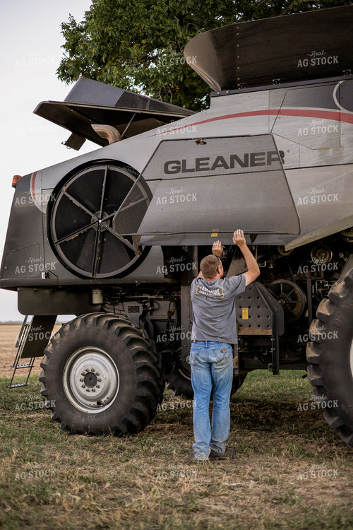 Farmer Working on Combine 93347