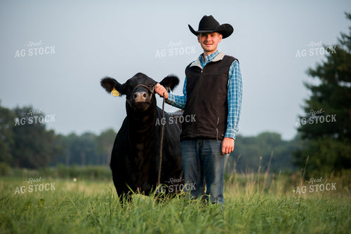 Farm Kid with Show Cow 76731