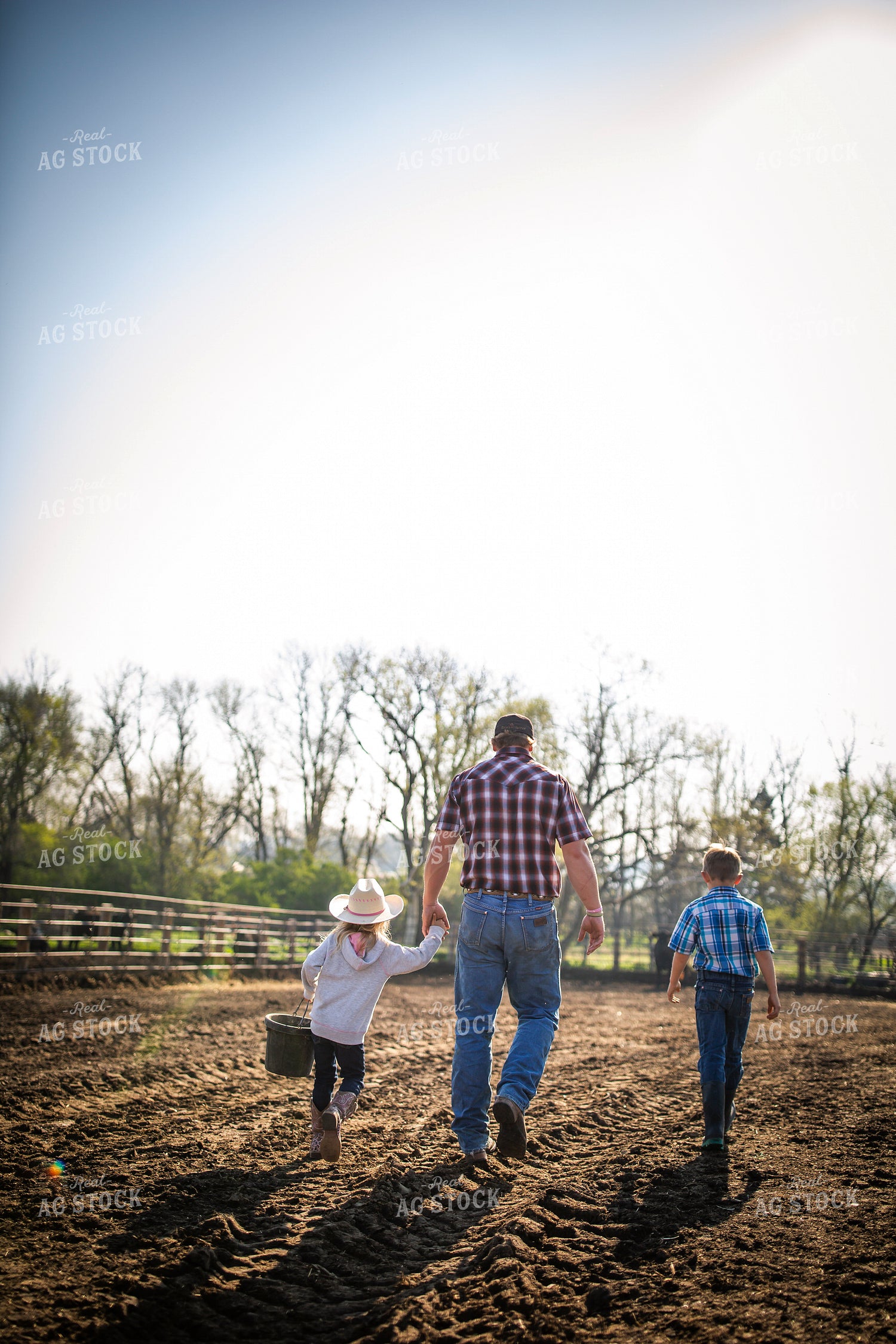 Rancher and Children on Farm 285038