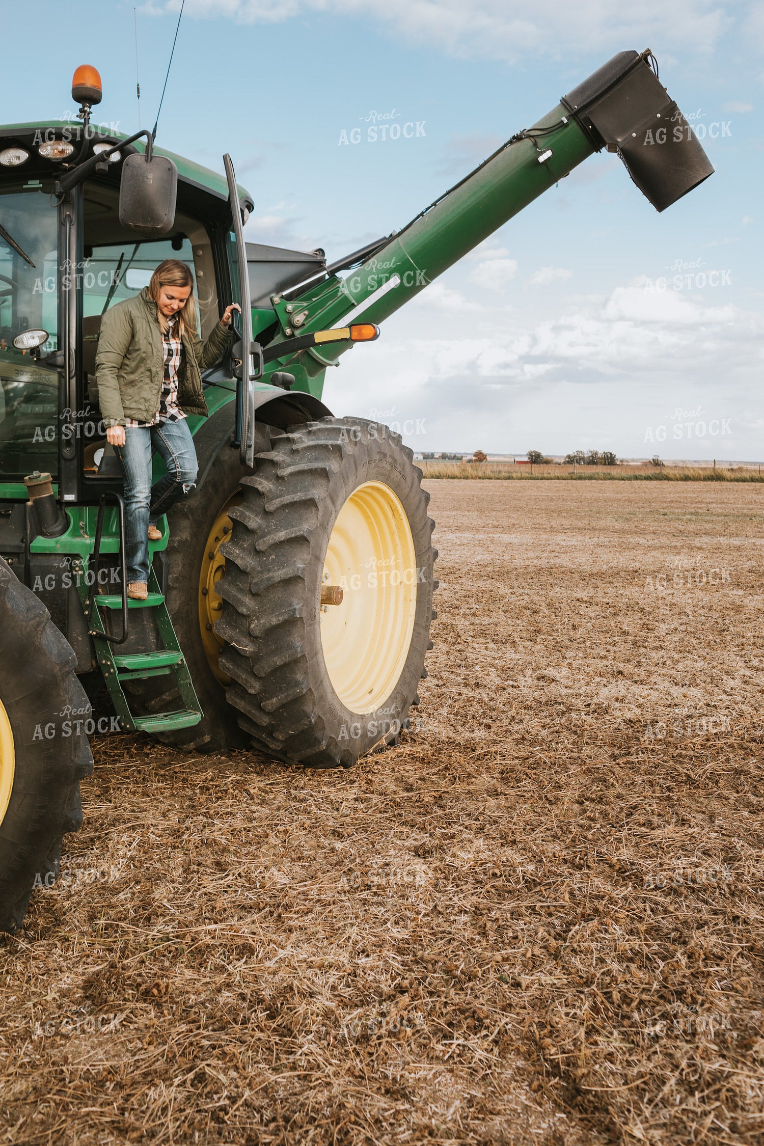 Female Farmer in Tractor with Grain Cart 3505