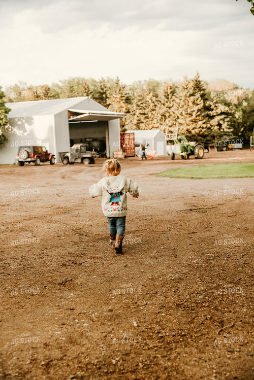 Farm Kid Walking Around Yard 64282
