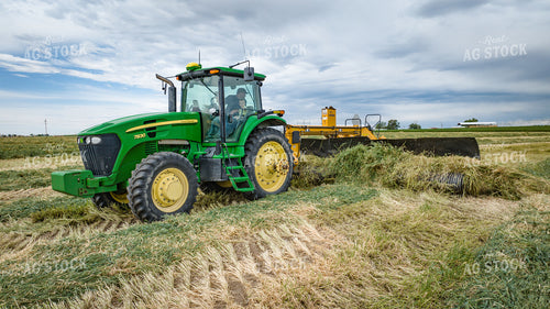 Tractor with Merger in Hay Field 56416