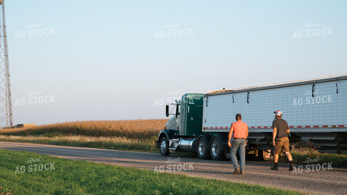 Farmers Walking to Semi 26057