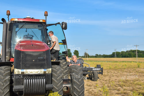 Farmers Getting into Tractor 84079