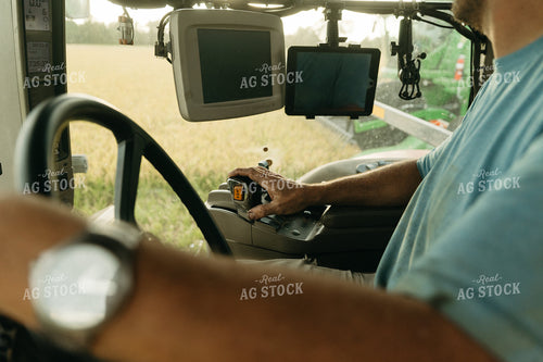 Farmer Driving Tractor in Rice Field 125276