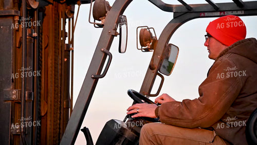 Loading the Seed Tender with a Skidsteer - 111