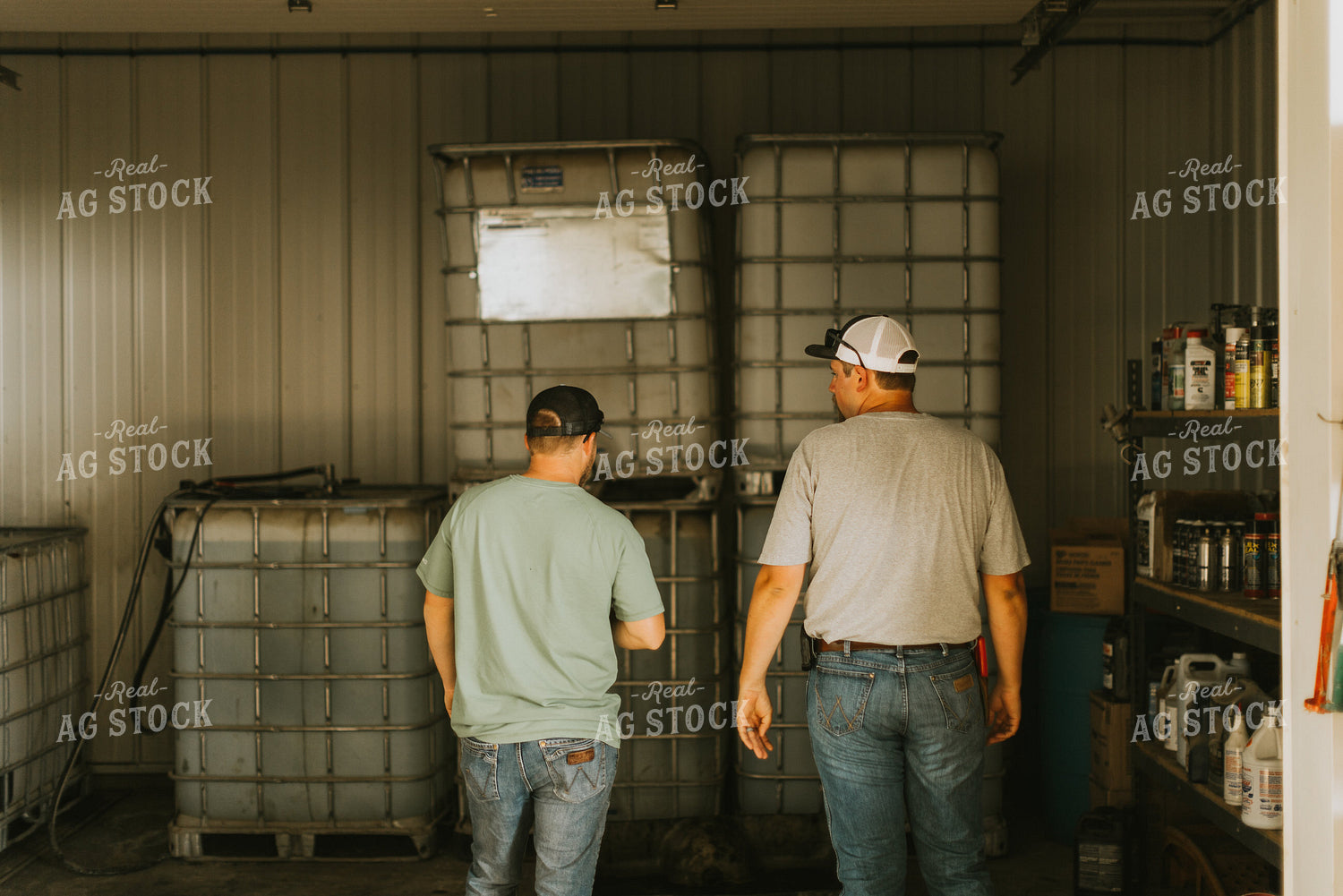 Farmers Talking in Shed 7747