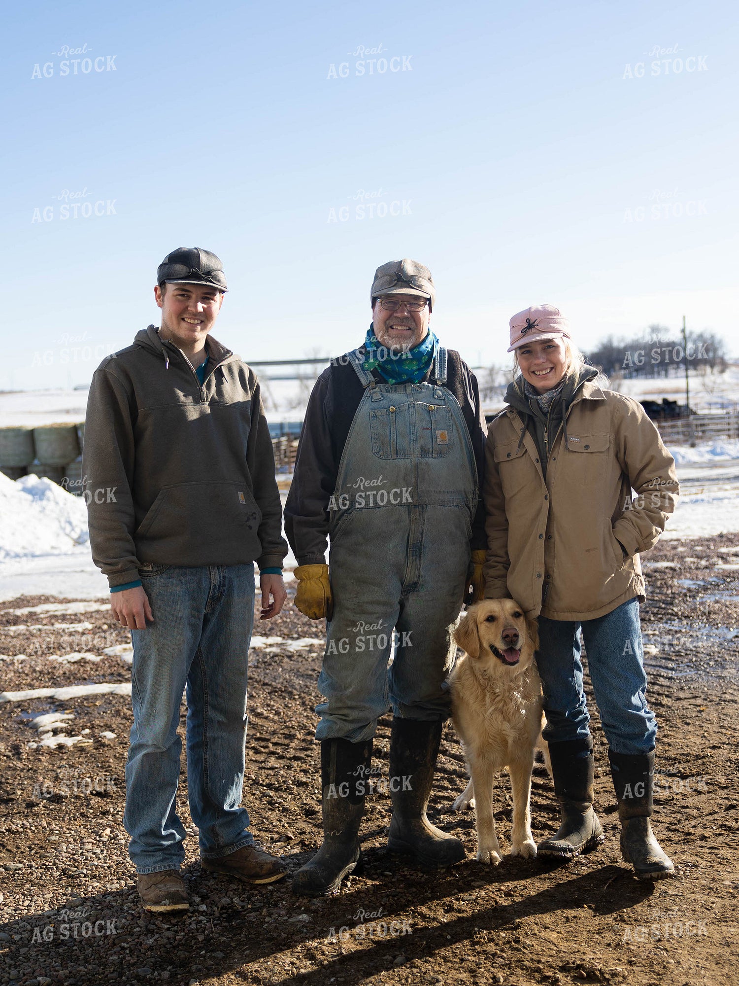 Ranchers Smiling on Farm 70239