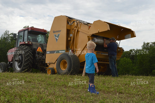 Farm Kid Watching Hay Baling 206037