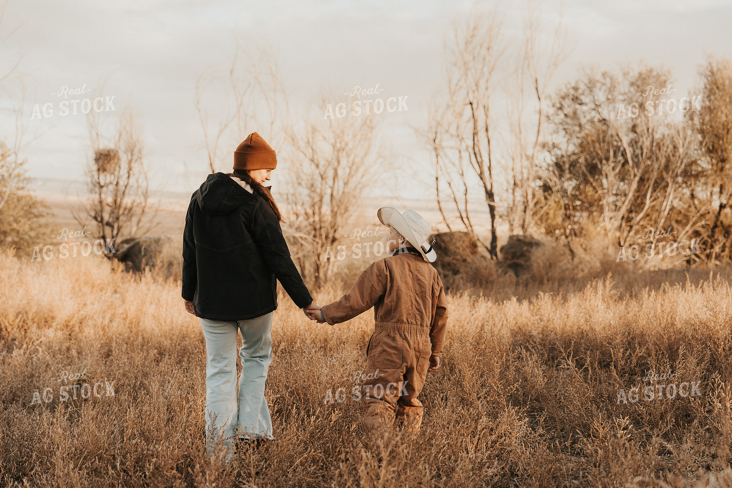 Female Rancher and Kid 61245