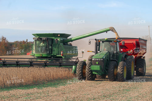 Combine Harvesting Soybeans and Unloading On the Go 52061