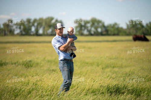 Farmer and Son in Pasture 212034