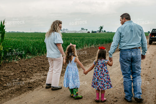 Farmers and Farm Kids Walking on Gravel Road 218069