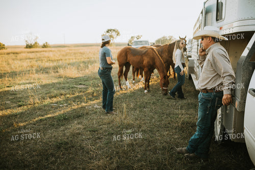Ranchers and Horses Near Livestock Trailer 6426