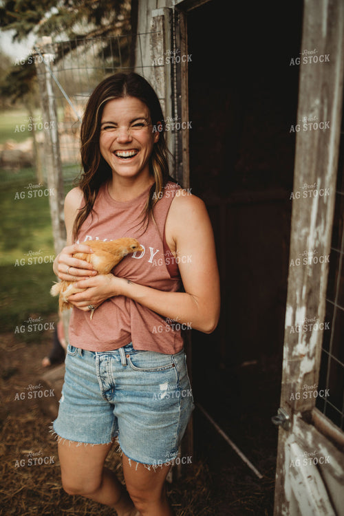 Farmer with Young Chickens 5585