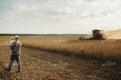 Farmer and Farm Kid Watching Combine 4826