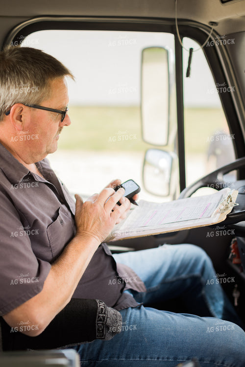 Farmer on Phone in Truck Cab 8043