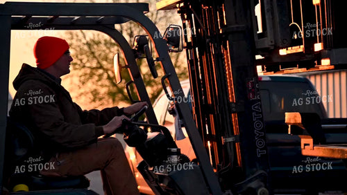 Loading the Seed Tender with a Skidsteer - 114