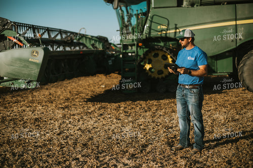 Farmer in Field With Tablet 7151