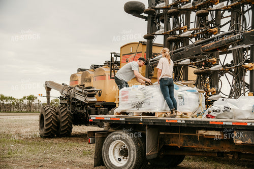 Farmers Loading Air Seeder 64270