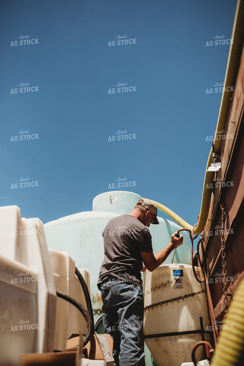 Farmer Mixing Chemicals 5769