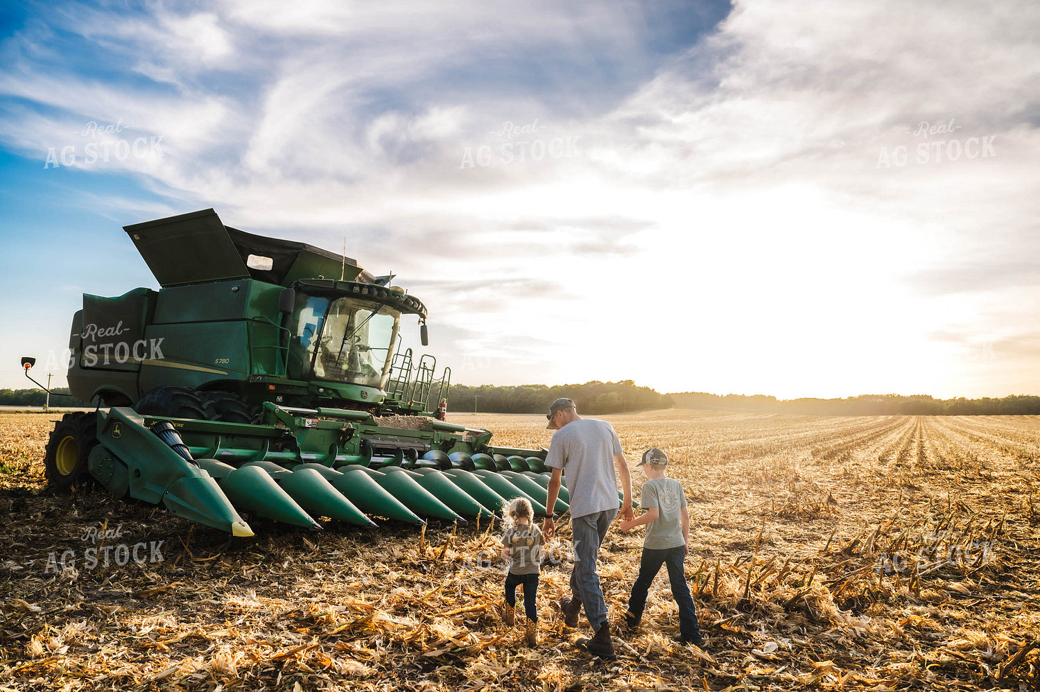 Farm Kids and Dad Walking by Combine 115378