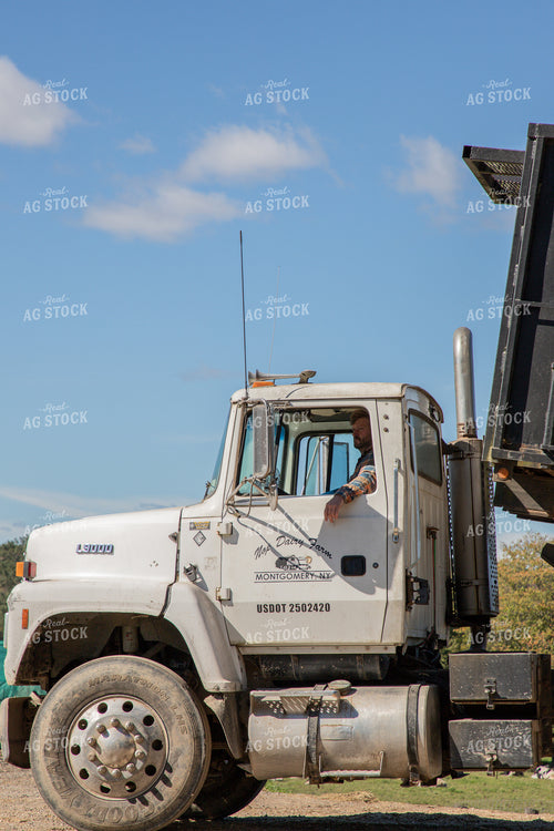 Farmer Unloading Trailer 142008