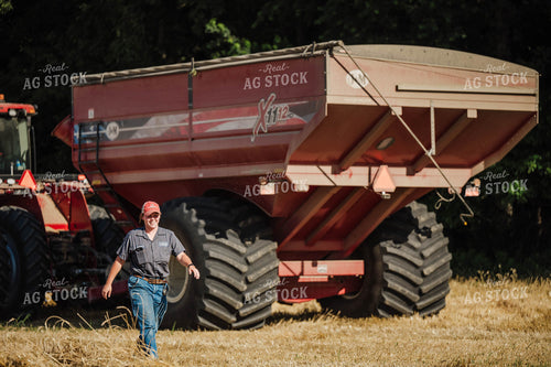 Female Farmer Walking by Tractor 115214