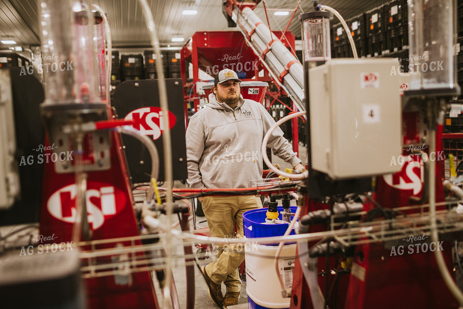 Man Monitoring Seed Treatment Chemical 5330